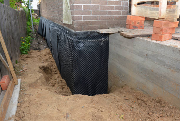 Happy homeowners after waterproofing job in Lilburn
